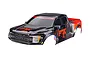 Traxxas 1/10 Ford Raptor R clipless RC body shell in Fox Red livery, featuring black and orange paint scheme with Fox Racing branding.