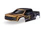 Traxxas Ford Raptor R clipless RC body shell in Fox Special Edition gold and black livery, viewed from a front three-quarter angle.