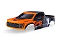 Traxxas 1/10 Ford Raptor R clipless RC body shell in Fox Orange and grey with black accents, shown from a front-quarter angle.