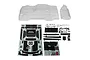 Team Associated 1/7 SR7 Hoonicorn unpainted clear polycarbonate body shell with included plastic detail parts and decal sheets on a white background.