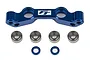 Factory Team blue anodised aluminium Ackerman plate with four metal ball bearings and two small blue spacers on a white background.