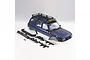 FMS 1/10 Toyota Land Cruiser LC80 blue painted RC body shell with roof rack, snorkel, and various black plastic bumper and mounting accessories.