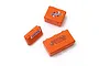 Three orange miniature storage boxes of varying sizes with decals, isolated on a white background.