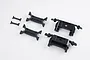 A set of black plastic RC chassis girder mounts and brackets on a white background.
