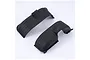Two black plastic rear fender liners for an RC vehicle, shown from a high-angle perspective against a white background.