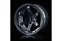 A single gunmetal grey MST TE37 style RC car rim with a six-spoke design, shown against a black background.