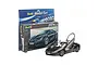 Revell 1/24 scale BMW i8 plastic model kit in its retail packaging with a fully assembled black model car displayed in front.