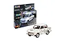 Revell 1/24 scale Trabant 601S model car kit, featuring a white car with peace-themed decals next to its retail packaging box.