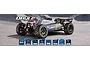 Maverick QByte XB Flux 1/12 scale RC buggy in blue and grey, shown on a concrete skate park background with feature icons.