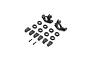 TLR front spindle set including two steering hubs, multiple plastic inserts, and two small screws on a white background.