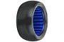 Pro-Line Convict 1/8 scale off-road RC truck tyre with a square-pin tread pattern and bright blue foam insert, isolated on a white background.