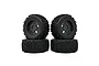 Four ARRMA dBoots Backflip RC monster truck tires stacked in two pairs against a white background.