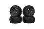 Four ARRMA dBoots Copperhead 2 RC monster truck tires with black multi-spoke wheels arranged in a two-by-two stack against a white background.