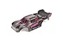 ARRMA Vorteks 1/10 scale RC truck body shell in black and grey with pink lightning bolt graphics and branding.