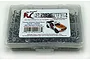 A clear plastic storage box filled with various stainless steel screws for a Traxxas Unlimited Desert Racer, featuring an RC Screwz label on top.