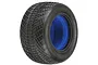 A single Pro-Line 2.2 inch Positron RC tyre with a distinct crisscross tread pattern and a bright blue foam insert visible inside.