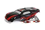 BlackZon 1/16 Slyder ST painted body shell in black and red with an included decal sheet on a white background.