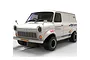 A 1/32 scale Scalextric Ford Transit Mk 1 Supervan slot car in white with racing decals, viewed from a front three-quarter angle.