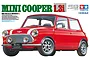 Tamiya 1/12 scale Mini Cooper 1.3i plastic model kit box art showing a red classic Mini Cooper with white roof and bonnet stripes.