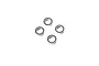 Four small metal ball bearings with black rubber seals arranged in a diamond pattern on a white background.