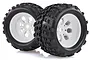 Two black off-road RC monster truck tyres mounted on white multi-spoke plastic rims, shown against a white background.
