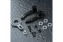 MST aluminium steering arm set including black steering arms, a silver servo horn, screws, washers, and ball bearings on a dark textured surface.