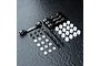 MST aluminium suspension arm mount set in black, including four metal mounts, screws, ball studs, and plastic spacers on a dark textured surface.