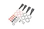 Losi 1/5 scale RC shock rebuild kit containing various rubber O-rings, seals, and four black rubber shock boots arranged on a white background.