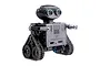 A Teching DM518 RC robot model kit featuring a grey metal body, tank-style treads, and a head with two large circular lens eyes.