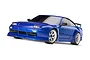 A studio shot of a blue Traxxas Nissan 240SX RC drift car with white wheels on a white background.