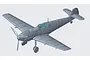 A 3D digital render of a Messerschmitt Bf109E-3 fighter aircraft model, shown in grey plastic with a translucent blue cockpit canopy.