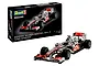 Revell 1/24 scale Vodafone McLaren Mercedes MP4-25 model kit box and a fully assembled model car on a white background.