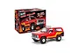 A Revell 1/25 scale '85 GMC Jimmy High Roller plastic model kit box and a fully assembled red model truck on a white background.