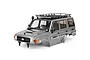 A silver grey RGT 1/10 scale Rescuer LC76 RC crawler body shell featuring a roof rack, snorkel, and detailed decals on a white background.