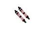 Two RGT silver aluminium adjustable RC shock absorbers with red springs on a white background.