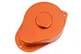 An orange anodized aluminium gear cover for an RC car, featuring a teardrop shape with a circular raised center and two mounting holes.