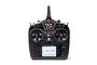 Studio product view of the black Spektrum NX8+ 20ch DSMX transmitter featuring dual gimbals, switches, and a digital LCD screen on a white background.