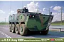 Box art illustration of the Academy 1/35 R.O.K. Army K808 Wheeled Armored Vehicle model kit driving on a road.
