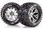 Two Louise 2.8 inch MT-Pioneer RC monster truck tyres mounted on chrome-finished multi-spoke wheels, shown against a white background.