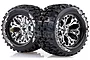 Two Louise 2.8 inch MT-Pioneer monster truck tyres pre-glued onto shiny chrome-finished multi-spoke RC wheels.