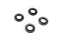 Four small black RC Maker shock shaft guides arranged on a plain white background.