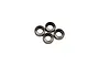 Four metal shielded RC hobby bearings arranged in a cluster against a plain white background.