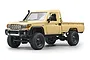 Studio product photo of the MN Model Toyota LC79 RC Rock Crawler in yellow, viewed from the front right three-quarters.