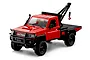 Red MN Model Toyota LC79 RC rock crawler with a black crane and flatbed on a white background.