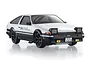 Kyosho First Mini-Z Initial D Toyota Trueno AE86 RC car studio shot in white and black with pop-up headlights.