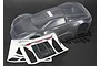 Unpainted clear polycarbonate body shell for Traxxas XO-1 RC car with included wing, mounting hardware, and decal sheets.