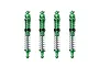 Four green aluminium adjustable RC shock absorbers with metal springs arranged vertically against a white background.