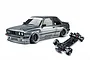 MST E30RB grey RC drift car with Pandem body kit and separate black chassis on a white background.