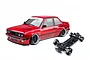 MST E30RB shiny red RC drift car body paired with a black RC car chassis on a plain white background.