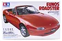 Tamiya 1/24 scale model kit box for a red Mazda Eunos Roadster, featuring artwork of the convertible sports car.